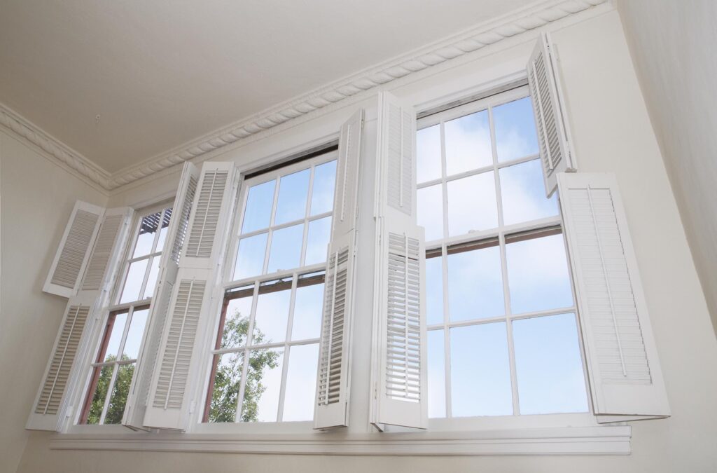 replacement windows with louver shutters